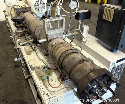 Used American Maplan 110mm Counter-Rotating Twin Screw Extruder, Model TS-110.  Approximate 26 to 1 L/D ratio.  Top vented barrel with electrically heated 1 and 2 barrel zones, zones 3, 4, and 5 offe...