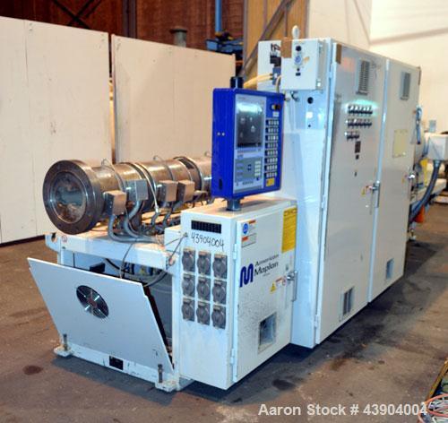 Used American Maplan 110 mm Counter-Rotating Twin Screw Extruder, Model TS-110. Approximately 26 to 1 L/D ratio. Top vented barrel with electrically heated 1 and 2 barrel zones, zones 3, 4, and 5 off...
