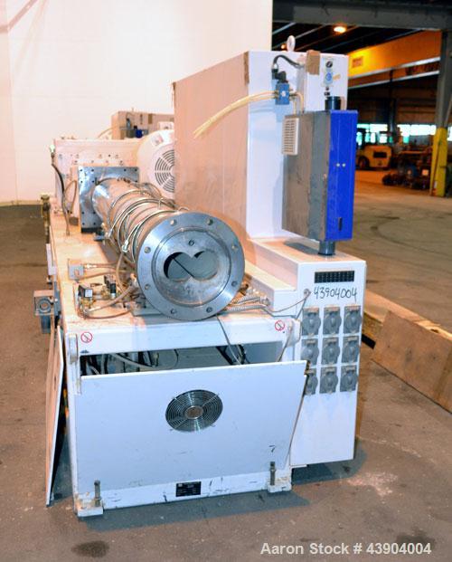 Used American Maplan 110 mm Counter-Rotating Twin Screw Extruder, Model TS-110. Approximately 26 to 1 L/D ratio. Top vented barrel with electrically heated 1 and 2 barrel zones, zones 3, 4, and 5 off...