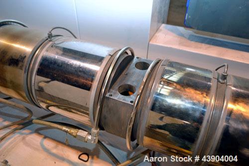 Used American Maplan 110 mm Counter-Rotating Twin Screw Extruder, Model TS-110. Approximately 26 to 1 L/D ratio. Top vented barrel with electrically heated 1 and 2 barrel zones, zones 3, 4, and 5 off...