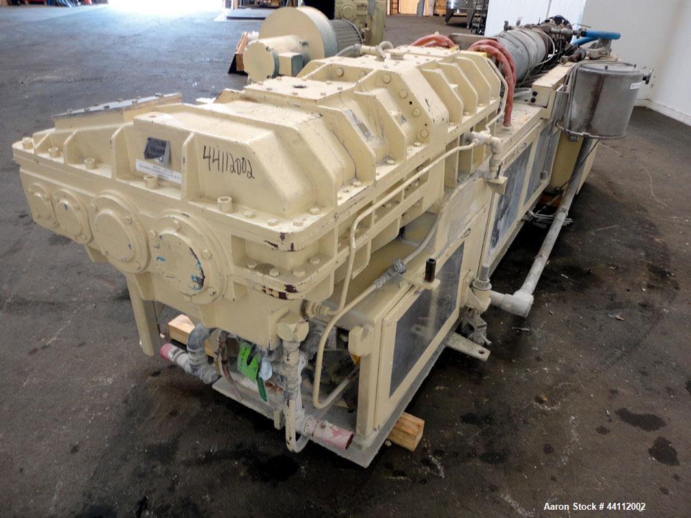 Used American Maplan 88mm Counter-Rotating Twin Screw Extruder, Model TS-88. Approximate 24 to 1 L/D ratio. (10) barrel zones, (1) section top vented, Electrically heated, liquid cooled. (2) Intermes...
