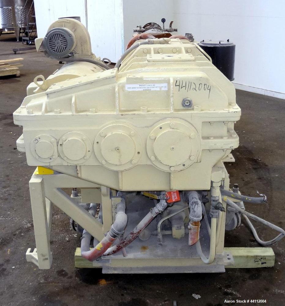 Used American Maplan 88mm Counter-Rotating Twin Screw Extruder, Model TS-88. Approximate 24 to 1 L/D ratio. (10) barrel zones, (1) section top vented, Electrically heated, liquid cooled. No screws. W...