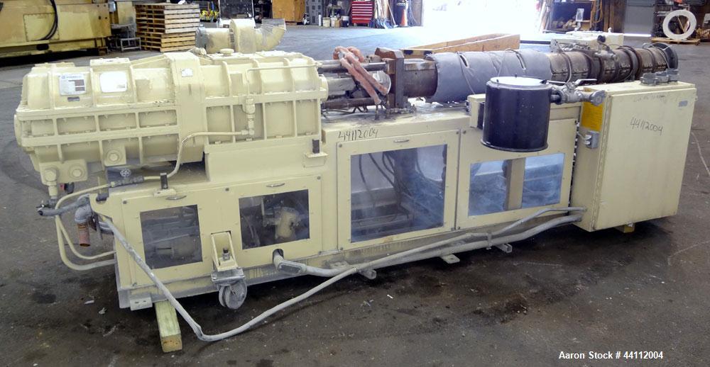 Used American Maplan 88mm Counter-Rotating Twin Screw Extruder, Model TS-88. Approximate 24 to 1 L/D ratio. (10) barrel zones, (1) section top vented, Electrically heated, liquid cooled. No screws. W...