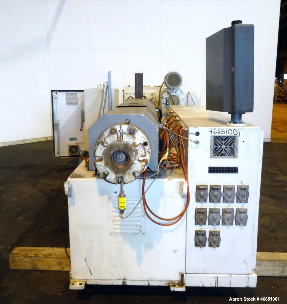 Used American Maplan 92mm Counter-Rotating Twin Screw Extruder, Model TS-92. Approximate 26 to 1 L/D ratio. 5 Zone barrel, (1) section top vented. Electrically heated, liquid cooled with pump, tank, ...