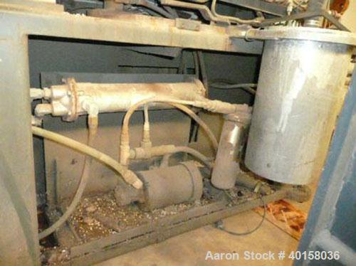 Used Cincinnati Milicron Conical Counter-Rotating Twin Screw Extruder, 55 mm, model CM55HP. Electrically heated, water cooled vented barrel with pump. Water cooled feed throat with a dosing feeder. A...