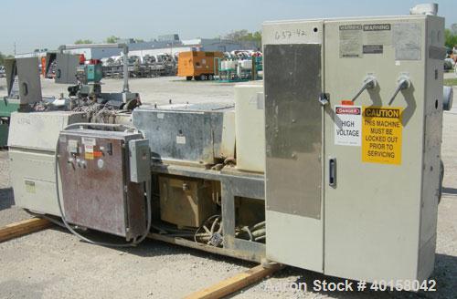 Used Cincinnati Milicron Conical Counter-Rotating Twin Screw Extruder, 80 mm, model CM80HP. Electrically heated, water cooled vented barrel with pump. Water cooled feed throat with a crammer feeder. ...