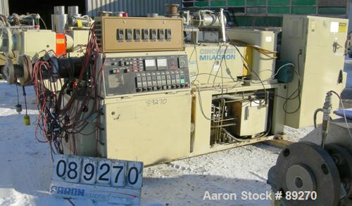 USED: Cincinnati conical counter-rotating twin screw extruder, 55 mm, model CM55. Approximate 20:1 L/D ratio. Approximate 48:1 gearbox ratio. Built-in oil heating and cooling with tank, heat exchange...