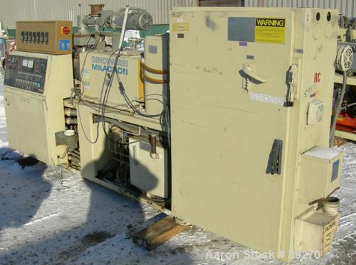 USED: Cincinnati conical counter-rotating twin screw extruder, 55 mm, model CM55. Approximate 20:1 L/D ratio. Approximate 48:1 gearbox ratio. Built-in oil heating and cooling with tank, heat exchange...