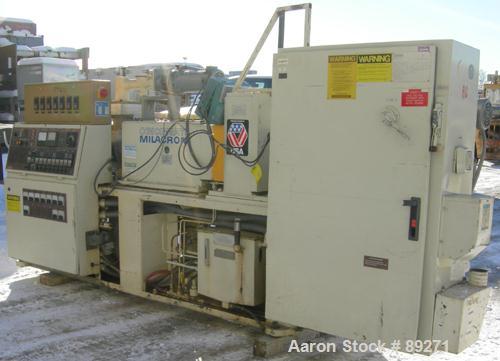 Used Cincinnati Conical Counter-Rotating Twin Screw Extrusion Equipment, 55 mm, model CM55. Approximate 20:1 L/D ratio. Approximate 48:1 gearbox ratio. Built-in oil heating and cooling with tank, hea...