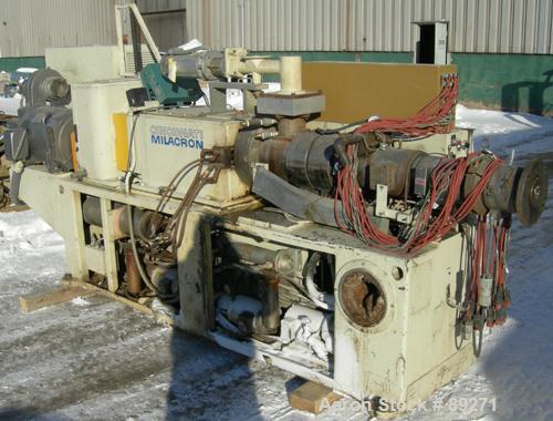 Used Cincinnati Conical Counter-Rotating Twin Screw Extrusion Equipment, 55 mm, model CM55. Approximate 20:1 L/D ratio. Approximate 48:1 gearbox ratio. Built-in oil heating and cooling with tank, hea...
