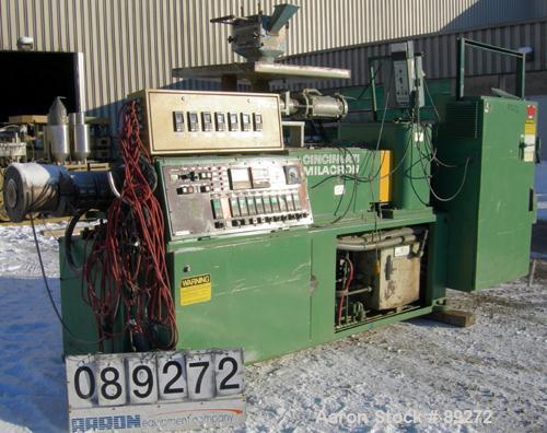 USED: Cincinnati conical counter-rotating twin screw extruder, 55 mm, model CM55. Approximate 20:1 L/D ratio. Approximate 48:1 gearbox ratio. Built-in oil heating and cooling with tank, heat exchange...