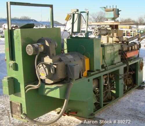USED: Cincinnati conical counter-rotating twin screw extruder, 55 mm, model CM55. Approximate 20:1 L/D ratio. Approximate 48:1 gearbox ratio. Built-in oil heating and cooling with tank, heat exchange...