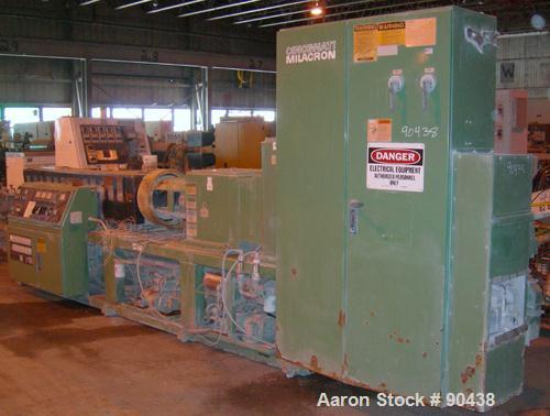 USED: Cincinnati counter-rotating twin screw extruder, 92 mm, model CM92HP. Electrically heated, water cooled 5 zone top vented barrel with tank, heat exchanger and pump. Built-in oil cooling/heating...