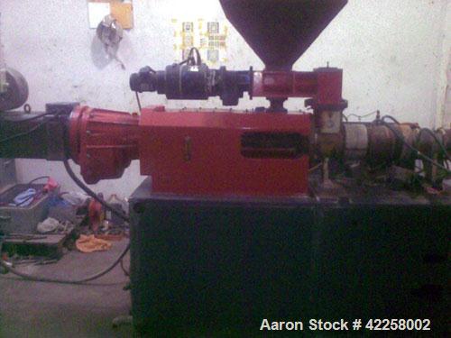 Used Cincinnati Milacron CMT-35 Counter Rotating Twin Screw Extruder. Conical, 1.38" / 2.76" (35/70 mm) diameter, 12.7 hp / 9.5 kW motor, 440V, 50 Hz, vented. Reconditioned with new electric componen...
