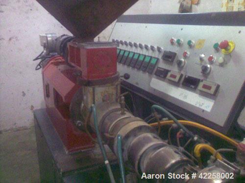 Used Cincinnati Milacron CMT-35 Counter Rotating Twin Screw Extruder. Conical, 1.38" / 2.76" (35/70 mm) diameter, 12.7 hp / 9.5 kW motor, 440V, 50 Hz, vented. Reconditioned with new electric componen...