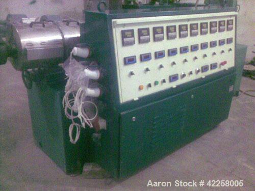 Used Cincinnati Milacron CM-45 1.77"/3.54" (45/90 mm) Twin Screw Extruder, conical, counter rotating, 27 hp/20.2 kW DC motor, 440V, 50 hz, air cooled barrel. Used for UPVC pipes/profiles. Recondition...