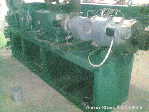 Used Cincinnati Milacron CM-45 1.77"/3.54" (45/90 mm) Twin Screw Extruder, conical, counter rotating, 27 hp/20.2 kW DC motor, 440V, 50 hz, air cooled barrel. Used for UPVC pipes/profiles. Recondition...
