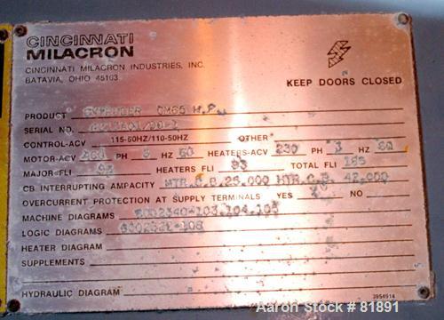 USED: Cincinnati Milacron Model CM-65HP Conical Twin Screw Counter-Rotating Extruder having an electrically heated, liquid cooled and vented barrel at an approximate 42" centerline height. Gearbox is...