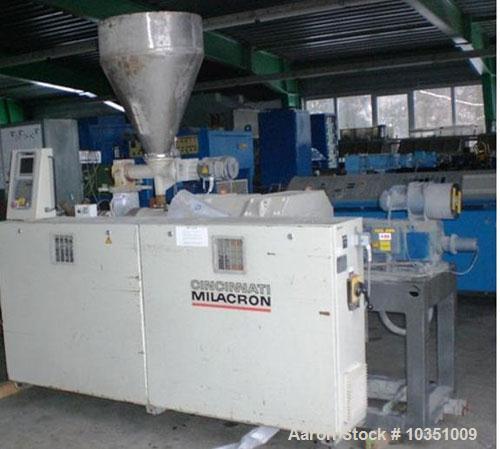 Used-Cincinnati Milacron CMT 45 Counter- Rotating Twin Screw Extruder. Maximum capacity 265 lbs (120 kg/hour). Screw diamete...