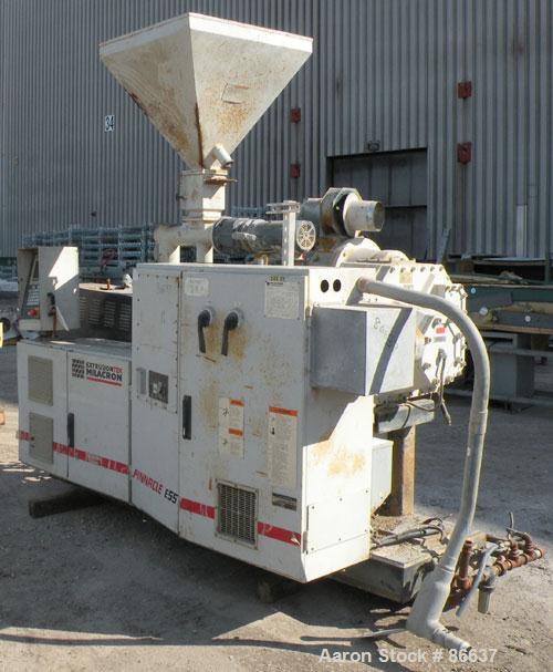 Used Cincinnati Milacron 55mm Conical Counter-Rotating Twin Screw Extruder, Model Pinnacle E55 PIN. Approximate 20 to 1 L/Dratio. Electrically heated, water cooled 3 zone vented barrel. Water cooled ...
