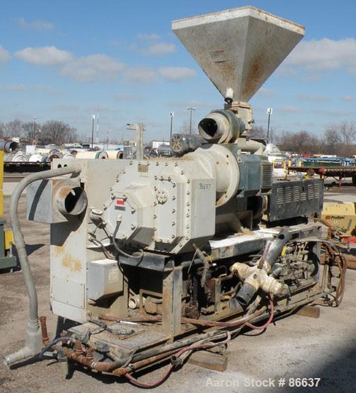 Used Cincinnati Milacron 55mm Conical Counter-Rotating Twin Screw Extruder, Model Pinnacle E55 PIN. Approximate 20 to 1 L/Dratio. Electrically heated, water cooled 3 zone vented barrel. Water cooled ...