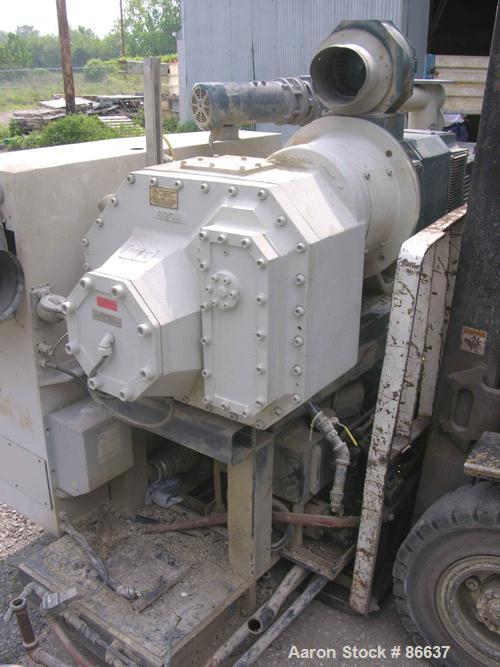 Used Cincinnati Milacron 55mm Conical Counter-Rotating Twin Screw Extruder, Model Pinnacle E55 PIN. Approximate 20 to 1 L/Dratio. Electrically heated, water cooled 3 zone vented barrel. Water cooled ...
