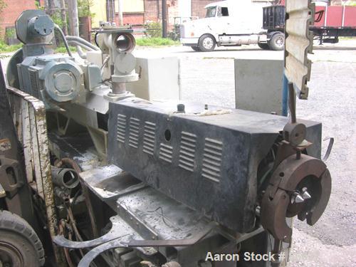 Used Cincinnati Milacron 55mm Conical Counter-Rotating Twin Screw Extruder, Model Pinnacle E55 PIN. Approximate 20 to 1 L/Dratio. Electrically heated, water cooled 3 zone vented barrel. Water cooled ...
