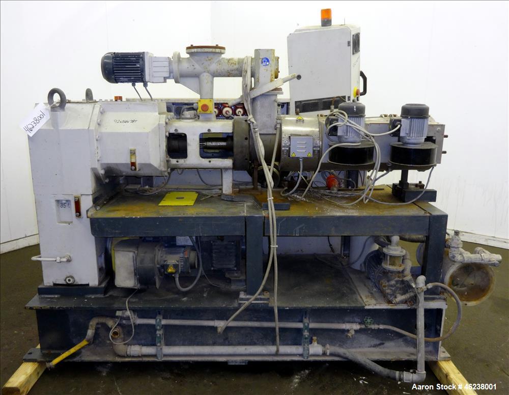 Used Cincinnati Extrusion 45mm Conical Twin Screw Extruder Type Titan 45P-APC. 1.77" (45 mm)/ 3.74" (95 mm) conical screws. Electrially heated, air cooled 3 zone barrel. Water cooled feed throat with...