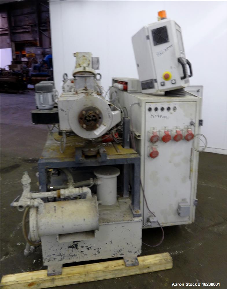 Used Cincinnati Extrusion 45mm Conical Twin Screw Extruder Type Titan 45P-APC. 1.77" (45 mm)/ 3.74" (95 mm) conical screws. Electrially heated, air cooled 3 zone barrel. Water cooled feed throat with...