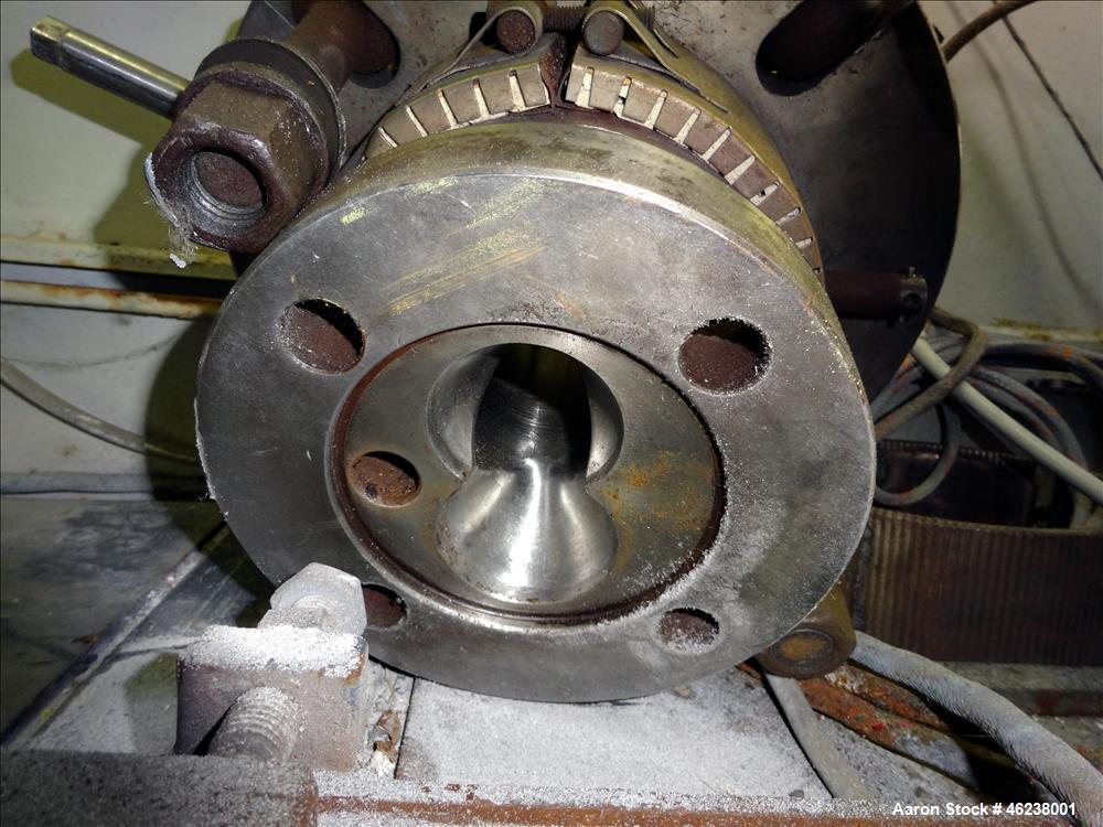 Used Cincinnati Extrusion 45mm Conical Twin Screw Extruder Type Titan 45P-APC. 1.77" (45 mm)/ 3.74" (95 mm) conical screws. Electrially heated, air cooled 3 zone barrel. Water cooled feed throat with...