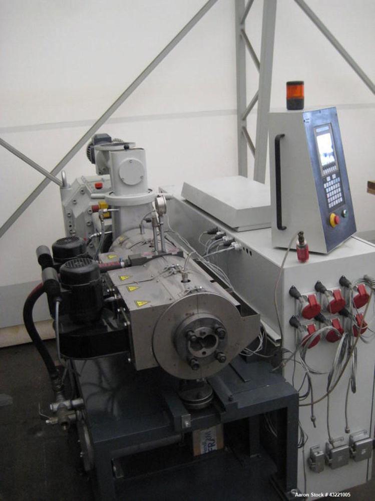 Used Cincinnati Titan 45 Conical Twin Screw Extruder for WPC profiles and PVC pipe. Screw diameter 1.77"/3.81" (45/97 mm). Maximum output 374 lbs (170 kilos/h). Motor 21 hp (16 kW). (4) Control zones...