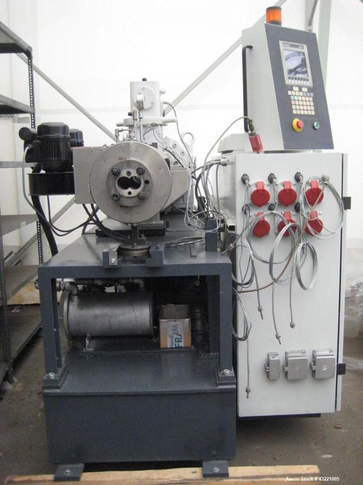 Used Cincinnati Titan 45 Conical Twin Screw Extruder for WPC profiles and PVC pipe. Screw diameter 1.77"/3.81" (45/97 mm). Maximum output 374 lbs (170 kilos/h). Motor 21 hp (16 kW). (4) Control zones...