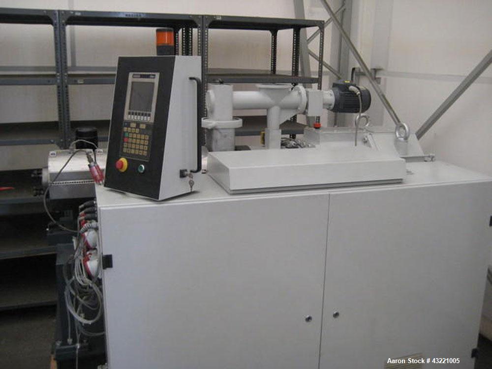 Used Cincinnati Titan 45 Conical Twin Screw Extruder for WPC profiles and PVC pipe. Screw diameter 1.77"/3.81" (45/97 mm). Maximum output 374 lbs (170 kilos/h). Motor 21 hp (16 kW). (4) Control zones...