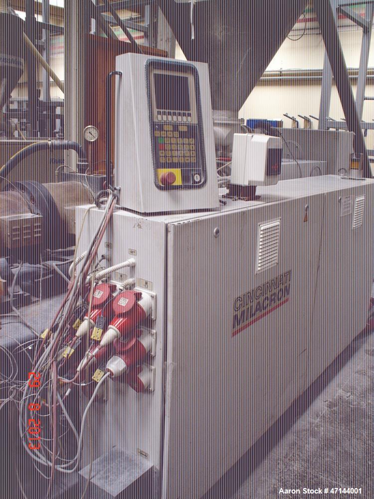 Used Cincinnati Twin-Screw Extruder Conical Milacron CMT 80-L. Year of production: 1995. Work hours: 39218 h D.C. shunt motor: 46kW Rating, installed and set: 1480.0 min-1 Speed: 297 Nm Torque: 0.7 k...