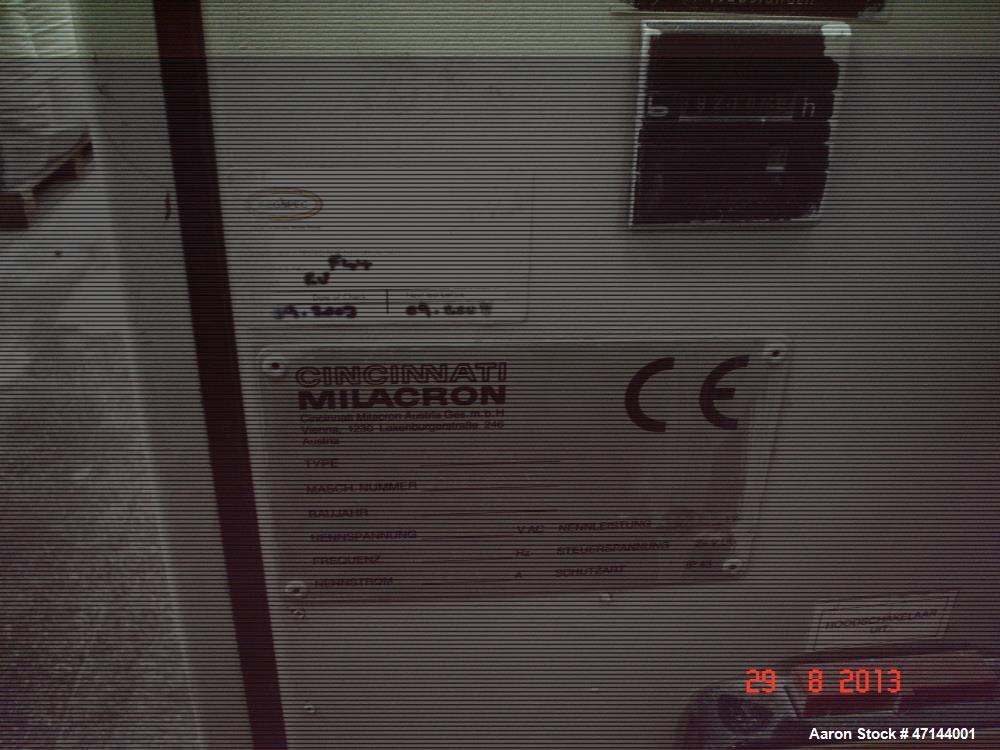 Used Cincinnati Twin-Screw Extruder Conical Milacron CMT 80-L. Year of production: 1995. Work hours: 39218 h D.C. shunt motor: 46kW Rating, installed and set: 1480.0 min-1 Speed: 297 Nm Torque: 0.7 k...