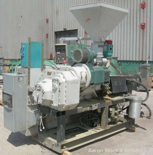 Used 55mm Cincinnati conical, counter rotating twin screw extruder. Has electrically heated, water cooled vented barrel, starve feeder, driven by 40 hp Reliance DC motor with SCR control. Extruder ha...
