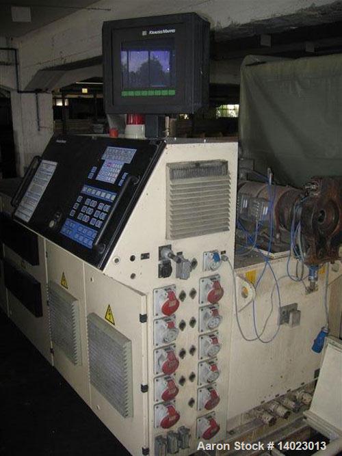 Used Krauss Maffei KMD 2-50 KK Conical Extruder.  Counter-rotating, screw diameter 2" - 4" (50 - 103 mm), screw length 41.7" (1060 mm), screw sped 4.3 - 43 rpm, 33.3 hp/25 kW drive, 400/50/3.  Produc...