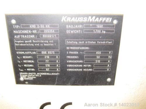 Used Krauss Maffei KMD 2-50 KK Conical Extruder.  Counter-rotating, screw diameter 2" - 4" (50 - 103 mm), screw length 41.7" (1060 mm), screw sped 4.3 - 43 rpm, 33.3 hp/25 kW drive, 400/50/3.  Produc...