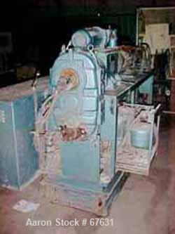 Used Krauss Maffei 50mm Counter-Rotating Twin Screw Extruder, Type KMD-2-50KK. (2) 50 mm diameter screws. Dosing feeder. Gearbox is direct driven by a 30 hp DC motor. Integral panel has 8 zones of di...