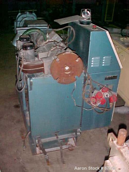 Used Krauss Maffei 40mm Counter-Rotating Twin Screw Extruder, Type KMD2-40KK. (2) 40 mm diameter screws. Gearbox is direct driven by a 25 hp DC motor. Integral panel has 8 zones of RKC digital contro...