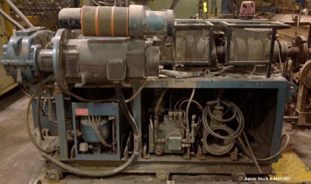 Used Krauss Maffei Model KMD2-50KK Counter-Rotating Twin Screw Extruder. 50 mm Diameter screws, 30 hp motor, 6 barrel and 8 die zones, serial #205325, year 1995.