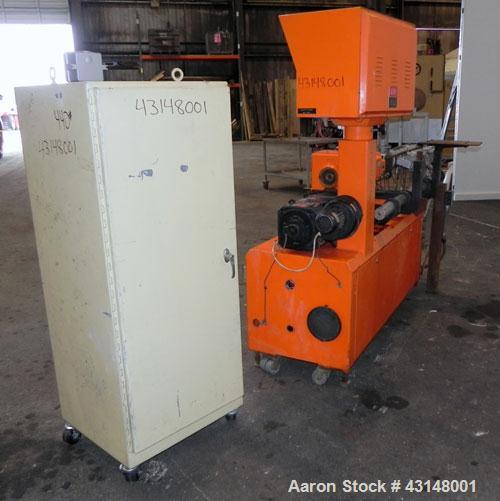 Used Leistritz 34mm Counter-Rotating Twin Screw Extruder, Model LSM30.34 GL. Approximately 38 to 1 L/D ratio. Electrically heated, air cooled 7 barrel zones, 1 water cooled feed zone with hopper. Scr...