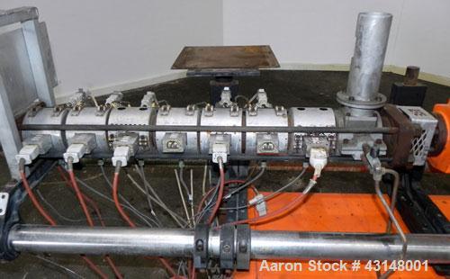 Used Leistritz 34mm Counter-Rotating Twin Screw Extruder, Model LSM30.34 GL. Approximately 38 to 1 L/D ratio. Electrically heated, air cooled 7 barrel zones, 1 water cooled feed zone with hopper. Scr...