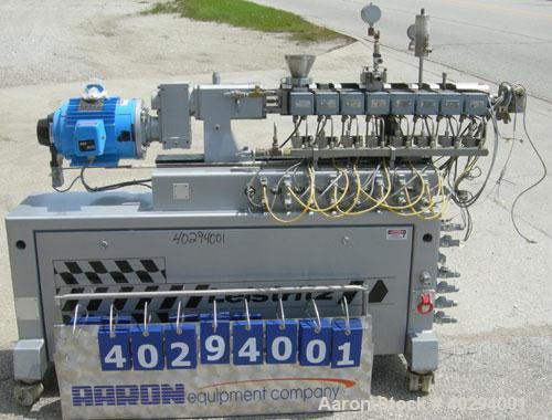 Used Leistritz Counter-Rotating 18 mm Twin Screw Extruder, Model MIC18/GG-40D. 8 Barrel sections, electrically heated, water cooled. Feed section with small hopper. Driven by a 3 hp, 3/60/120 hz, 230...