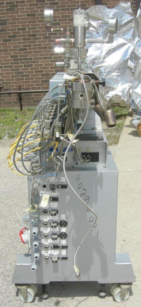 Used Leistritz Counter-Rotating 18 mm Twin Screw Extruder, Model MIC18/GG-40D. 8 Barrel sections, electrically heated, water cooled. Feed section with small hopper. Driven by a 3 hp, 3/60/120 hz, 230...