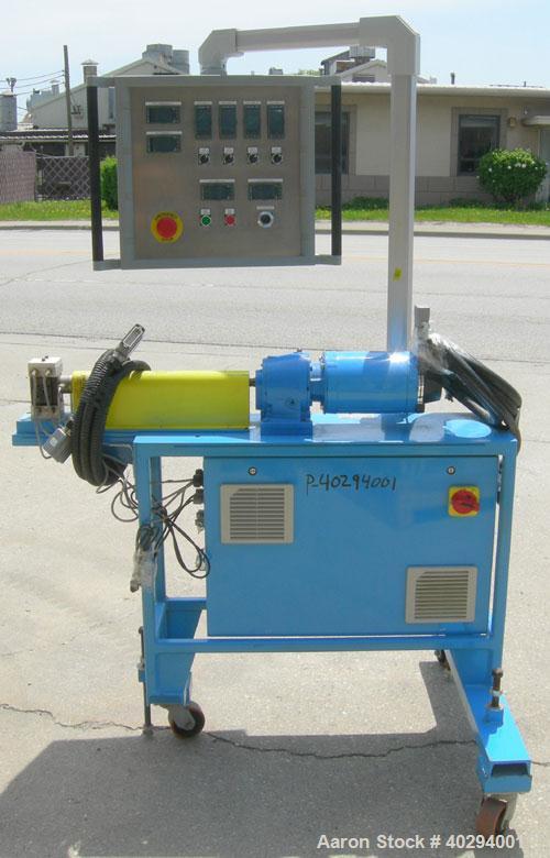 Used Leistritz Counter-Rotating 18 mm Twin Screw Extruder, Model MIC18/GG-40D. 8 Barrel sections, electrically heated, water cooled. Feed section with small hopper. Driven by a 3 hp, 3/60/120 hz, 230...