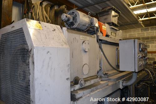 Used Ikegai 65mm Twin Screw Extruder, Model PCM-65II. Liquid heated, and cooled. 8 Zone top vented barrel. Top mounted twin screw feeder. Approximate 64" centerline height. Extruder driven by a 75kw ...