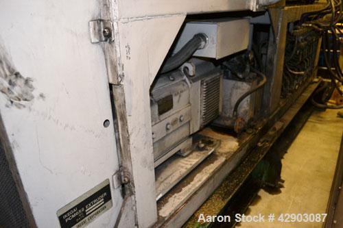 Used Ikegai 65mm Twin Screw Extruder, Model PCM-65II. Liquid heated, and cooled. 8 Zone top vented barrel. Top mounted twin screw feeder. Approximate 64" centerline height. Extruder driven by a 75kw ...