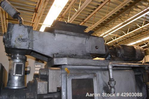 Used Ikegai 65mm Twin Screw Extruder, Model PCM-65II. Liquid heated, and cooled. 8 Zone top vented barrel. Top mounted twin screw feeder. Approximate 64" centerline height. Extruder driven by a 55kw ...