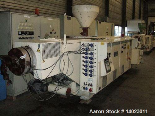 Used Weber DS 12 P Counter-Rotating Twin Screw Extruder.  Screw diameter 4.7" (120 mm).  L/D ratio 19.  Motor 100 hp (75 kW).  Maximum screw speed 20 rpm.  (5) Heating zones, (2) cooling zones.  Maxi...